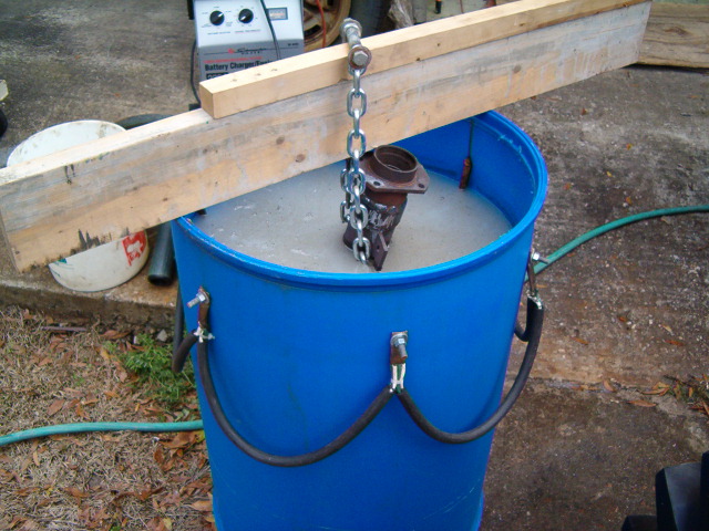 electrolysis set up with laundry soda to help remove rust